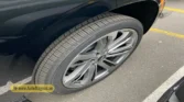 2026 Cadillac Escalade ESV front alloy wheel and Bridgestone tire detail view