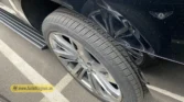2026 Cadillac Escalade ESV rear alloy wheel and tire detail view