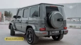 2026 Mercedes-Benz G-Class MBS Edition rear three-quarter exterior view showcasing spare tire cover and alloy wheels