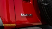 2026 Suzuki Jimny GLX AT rear tailgate and chrome emblem detail closeup