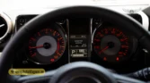2026 Suzuki Jimny GLX AT digital instrument cluster closeup showing the tachometer, speedometer, and multi-information display screen