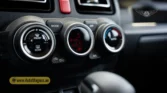 2026 Suzuki Jimny GLX AT automatic gear shift lever, center console trim, and cupholder layout