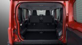 2026 Suzuki Jimny GLX AT rear cargo area view showing the folded rear seats and luggage compartment